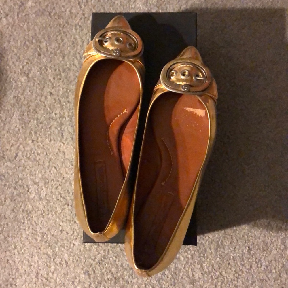 BCBG MaxAzria Gold Flats with buckles at the tip